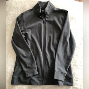 Gray zip-up jacket with pockets. Soft feel. Material is polyester and spandex.